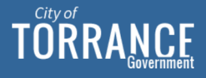 Logo featuring the text "city of torrance government" in white on a blue background.