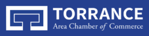 Logo of the torrance area chamber of commerce featuring white text and a geometric design on a blue background.